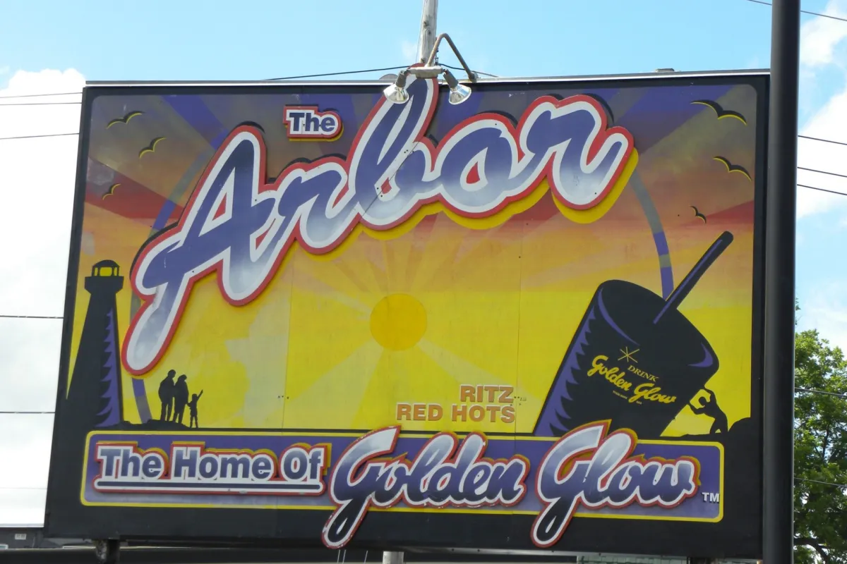 The Arbor's sign on Main Street in Port Dover, advertising Golden Glow and Ritz Red Hots, July 2009.